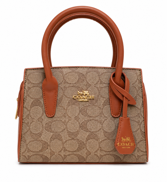 Coach Andrea Carryall en Lona Signature